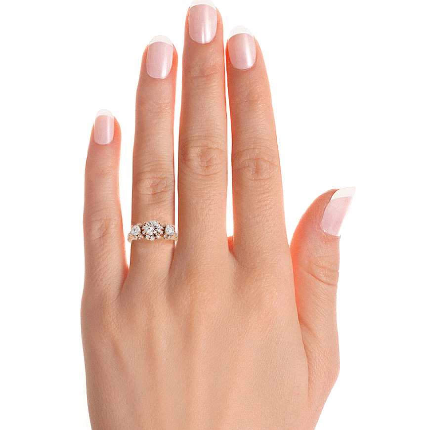 Yellow gold trilogy flower halo engagement ring for a sparkling solitaire look