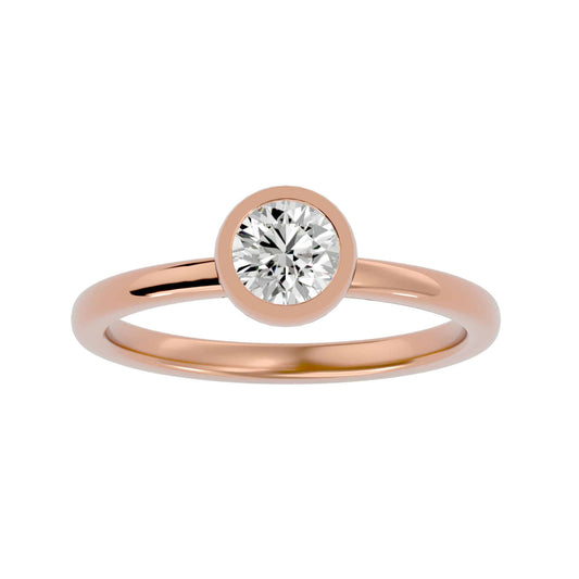 Bezel-set solitaire engagement ring in 18K gold with sleek, modern design