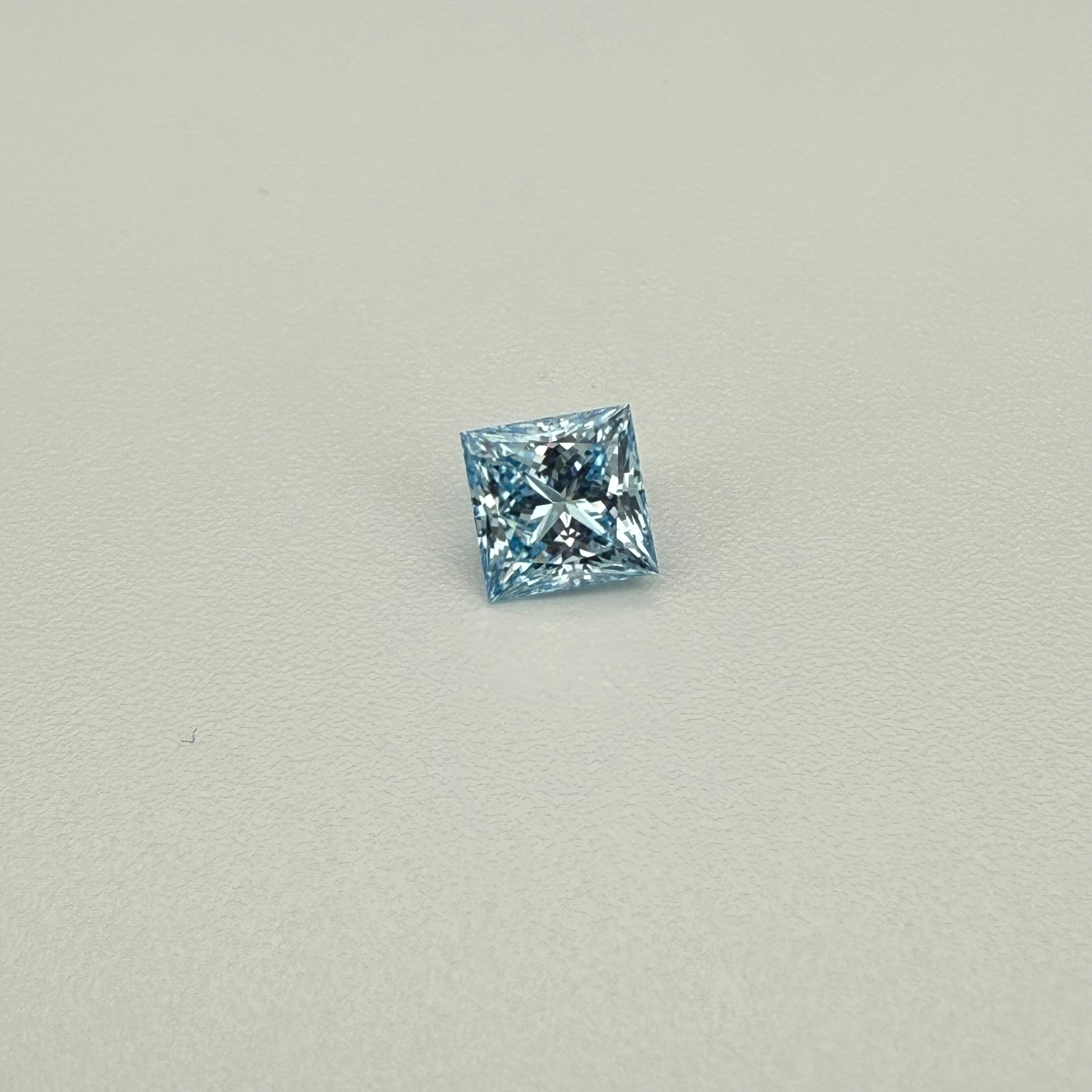 
                    princess cut blue diamond
                  