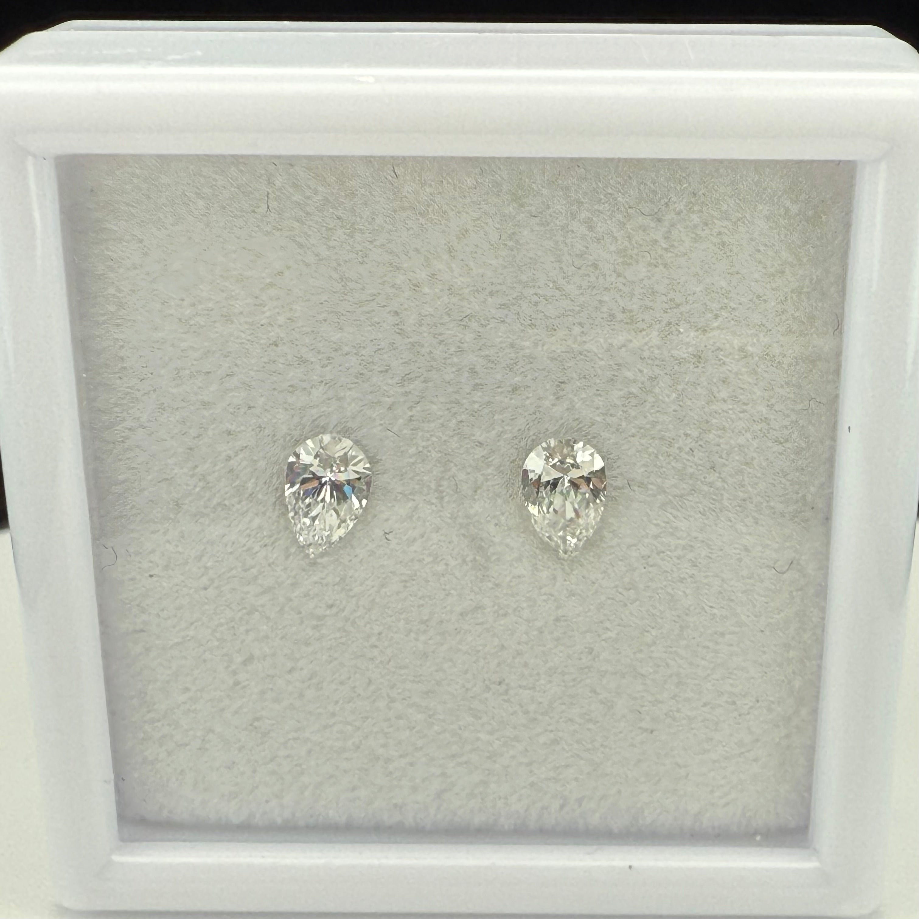 
                    pear shape lab grown diamond pair
                  