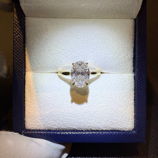 oval hidden halo engagement ring