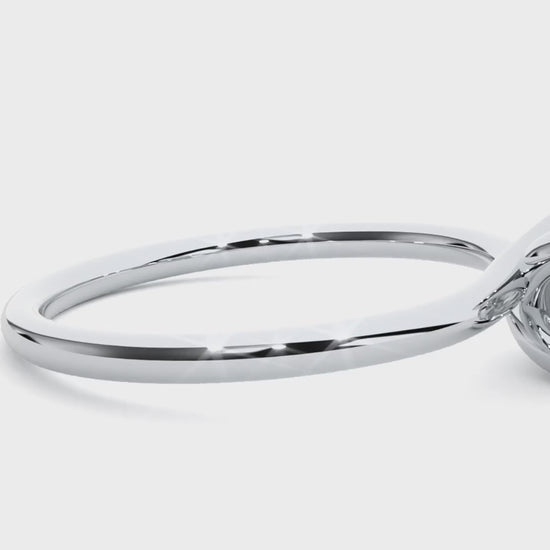 Classic solitaire engagement ring with lab-created diamond and sleek prong design