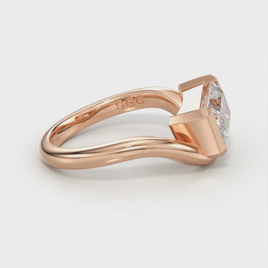 radiant half bezel engagement ring