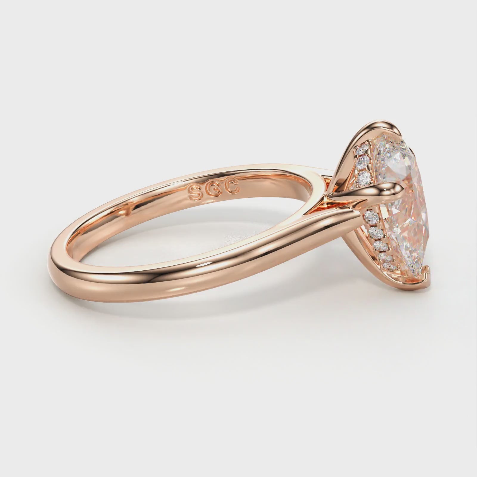 pear cut hidden halo ring