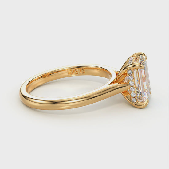 emerald cut hidden halo ring