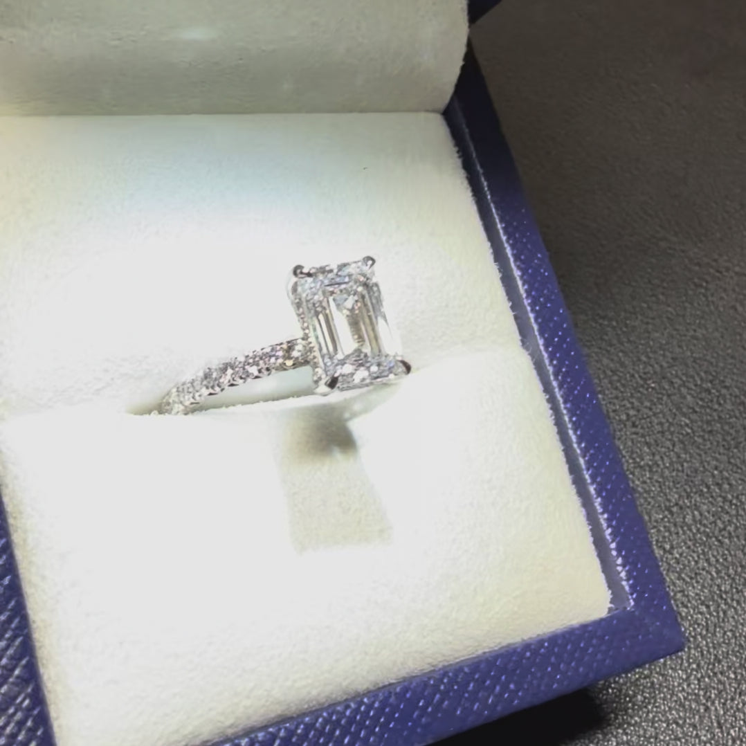 pave band emerald solitaire